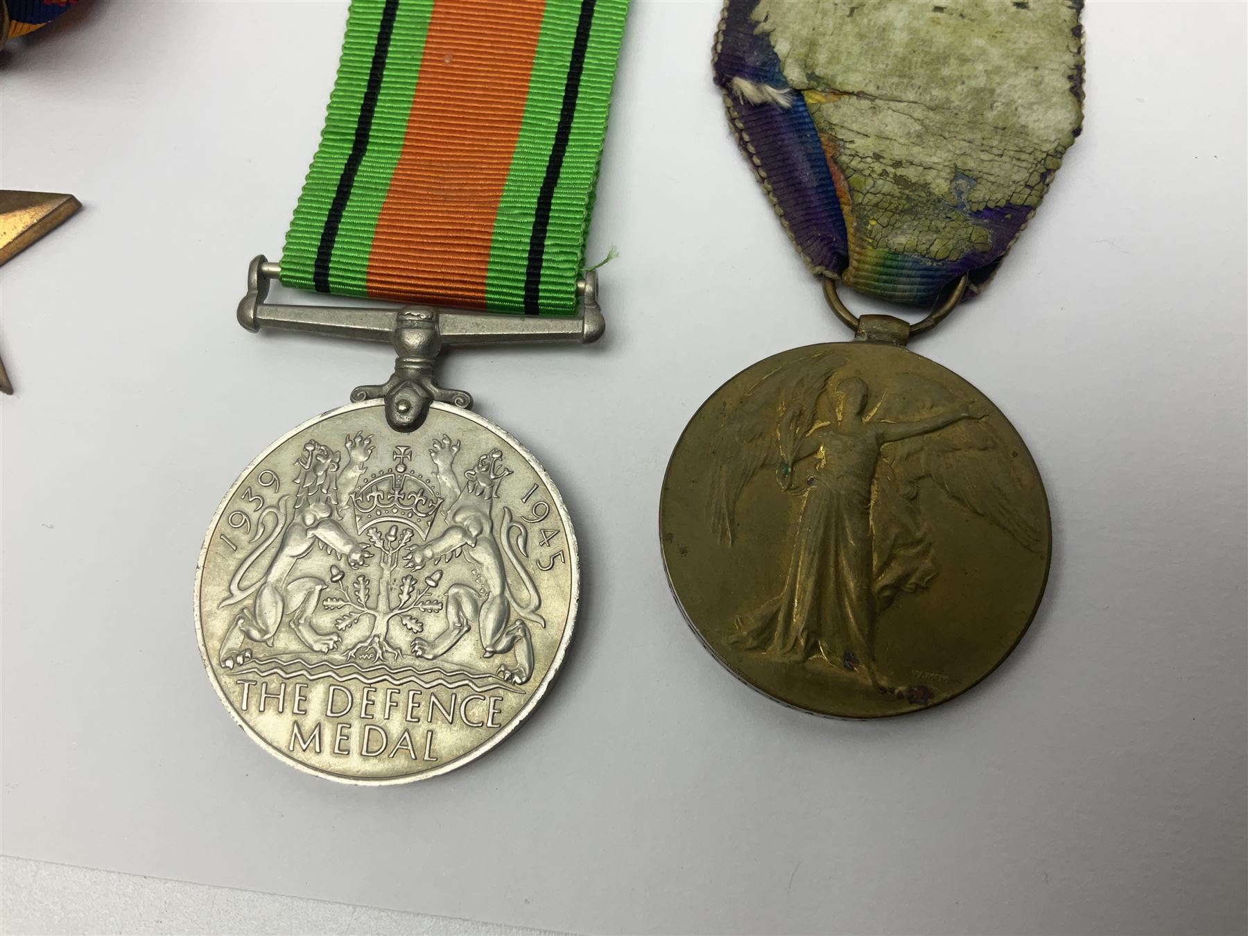 WW1 pair of medals comprising British war medal and Victory Medal awarded to 19774 Pte. G. Headlam Sea. Highrs.; another WW1 pair of medals comprising British War Medal and Mercantile Marine Medal awarded to Charles Filburn; WW2 group of five medals comprising 1939-45 War Medal, Defence Medal, 1939-45 Star, Africa Star and Burma Star; in issue box addressed to Mr. H, Smithson with medal slip; all with ribbons; and Edward VIII Coronation medal (10)
