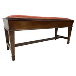 Early 20th century mahogany piano duet stool, hinged top  enclosing compartment with sheet music,seat upholstered in striped crimson fabric, reeded edge, on square tapering supports with spade feet