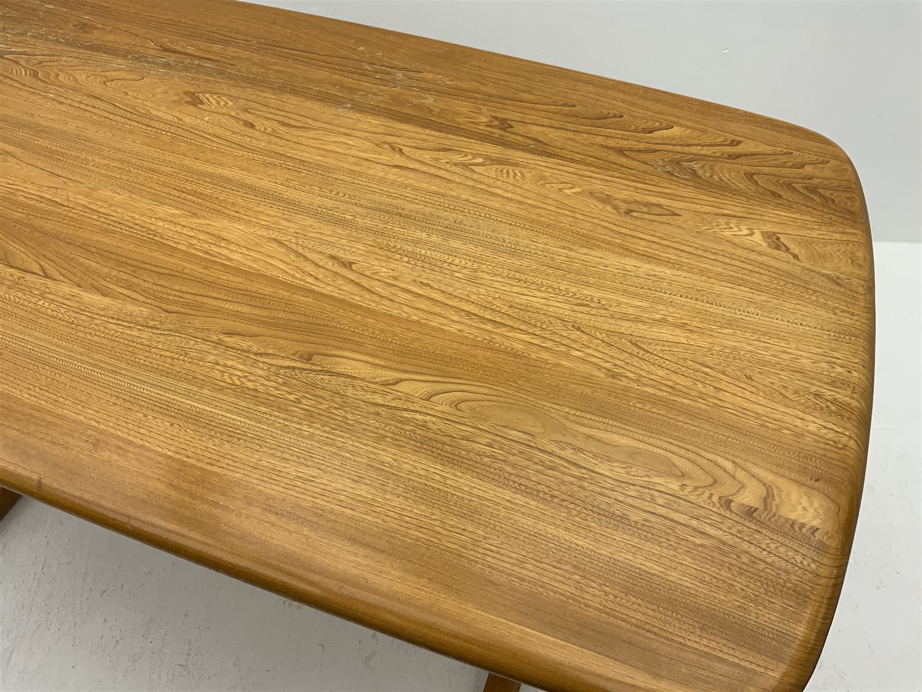 Ercol rectangular light elm dining table, rounded corners The