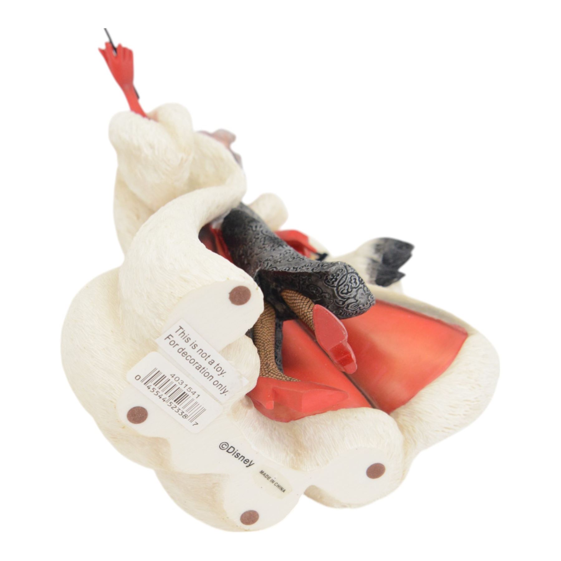 Disney Showcase Haute Couture figures, comprising Evil Queen, Cruella Devil and two Malificent, all boxed