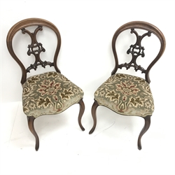 Pair Victorian walnut bedroom chairs with pierced and carved balloon backs, upholstered serpentine seat, cabriole legs, W48cm