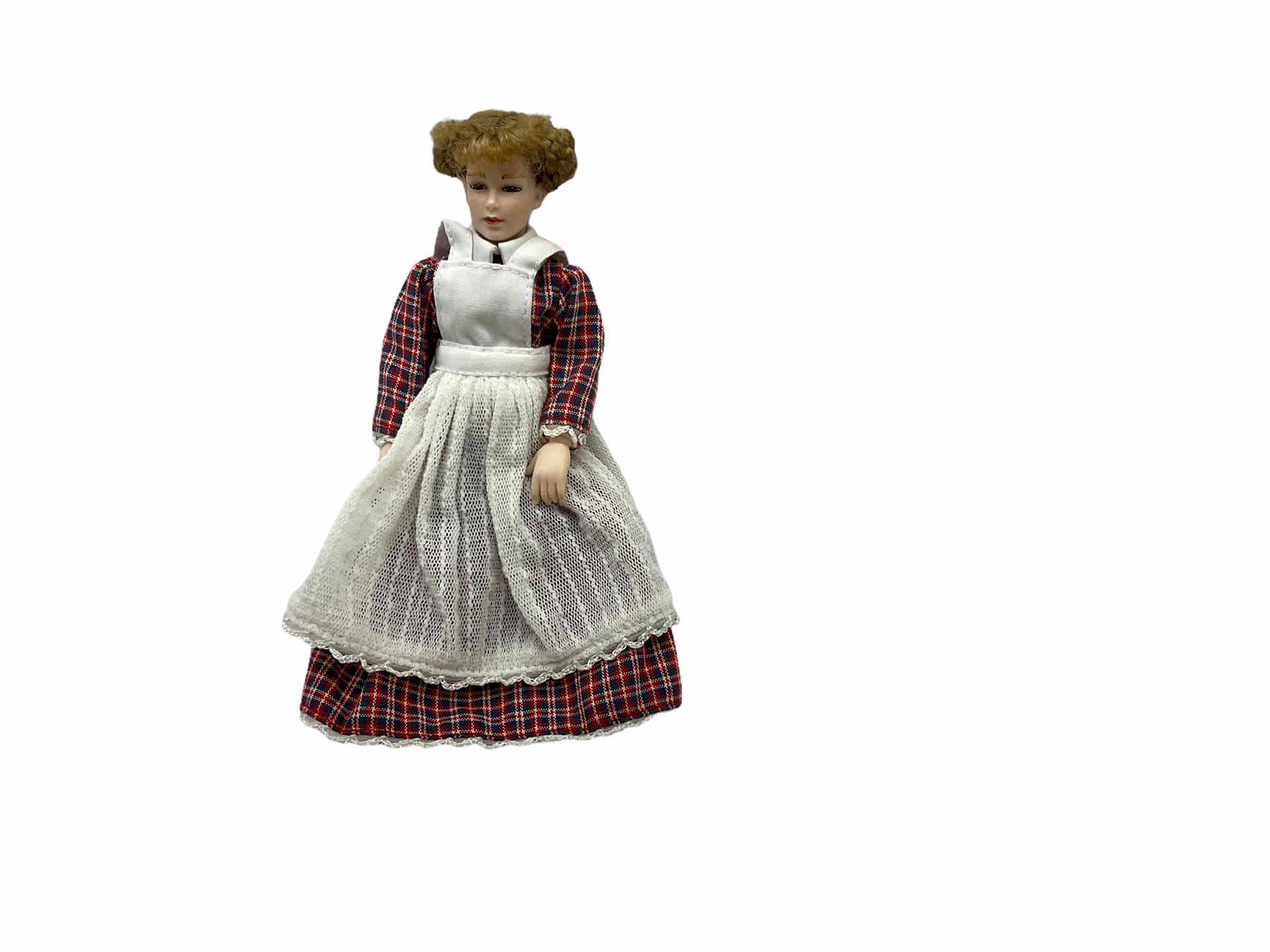 Heidi Ott doll in tartan dress, navy floral dress with white lace and ribbon detailing, striped blue and white dress and a 'Head to Toe' book
