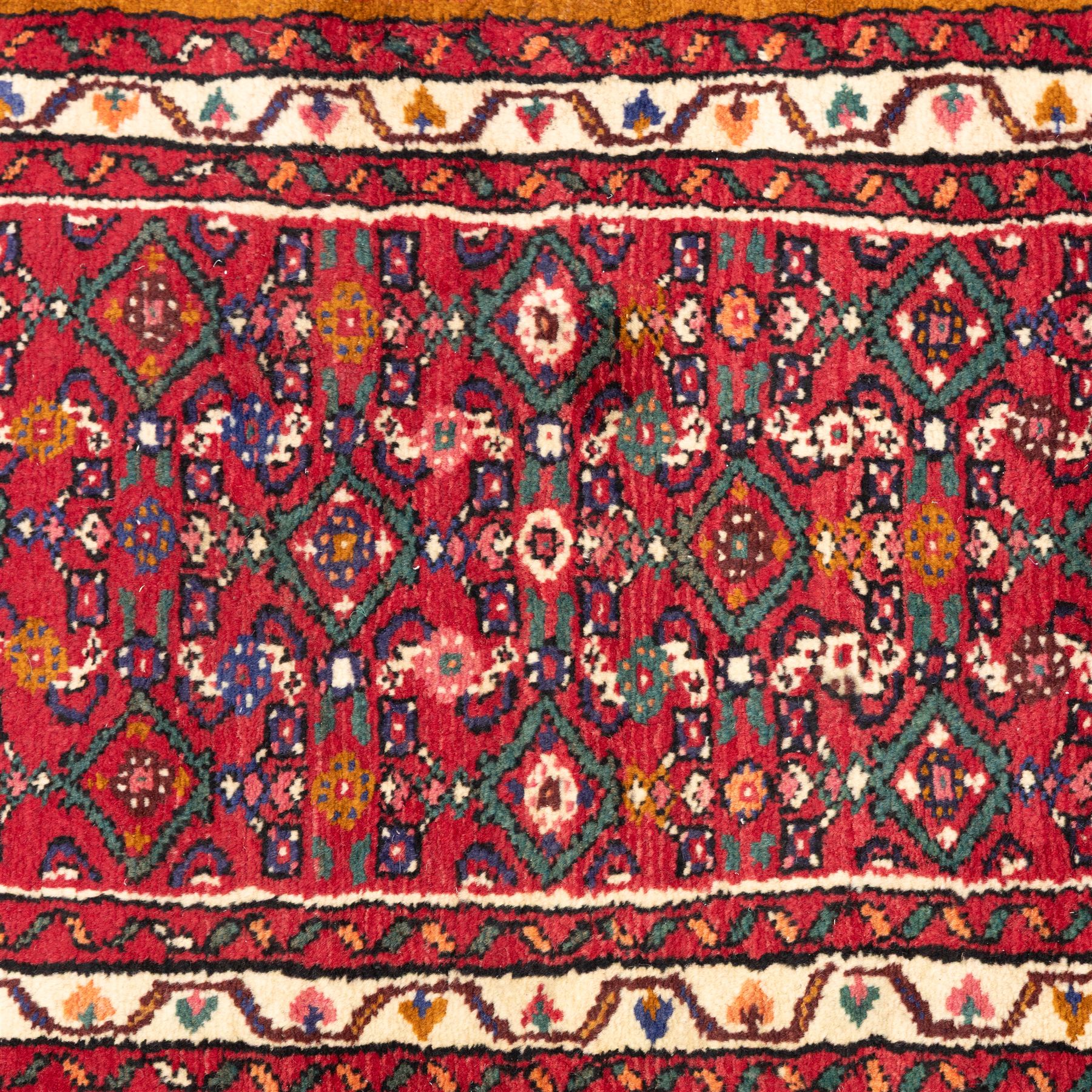 North west Persian hand-knotted Malayer runner, vibrant rose field with an all-over lattice design of lozenges and stylised floral motifs, ivory spandrels within a zig-zag main border flanked by multiple guard stripes 