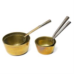 Four Victorian brass saucepans, largest 17cm, copper saucepan 19cm, copper pan and lid