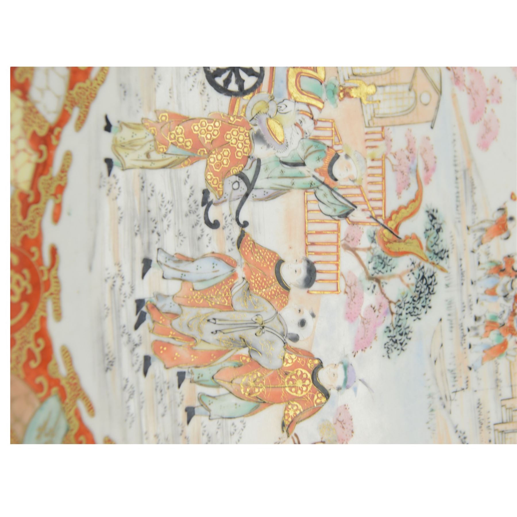 19th century Japanese Kutani charger, painted with a procession of figures and elephant within a hillside landscape detailed with dwellings, with character mark beneath, D30.5cm