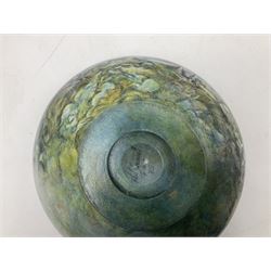 Wooden hand painted bowl, decorated with trees on a blue ground, signed Phil Crennell beneath, D28cm