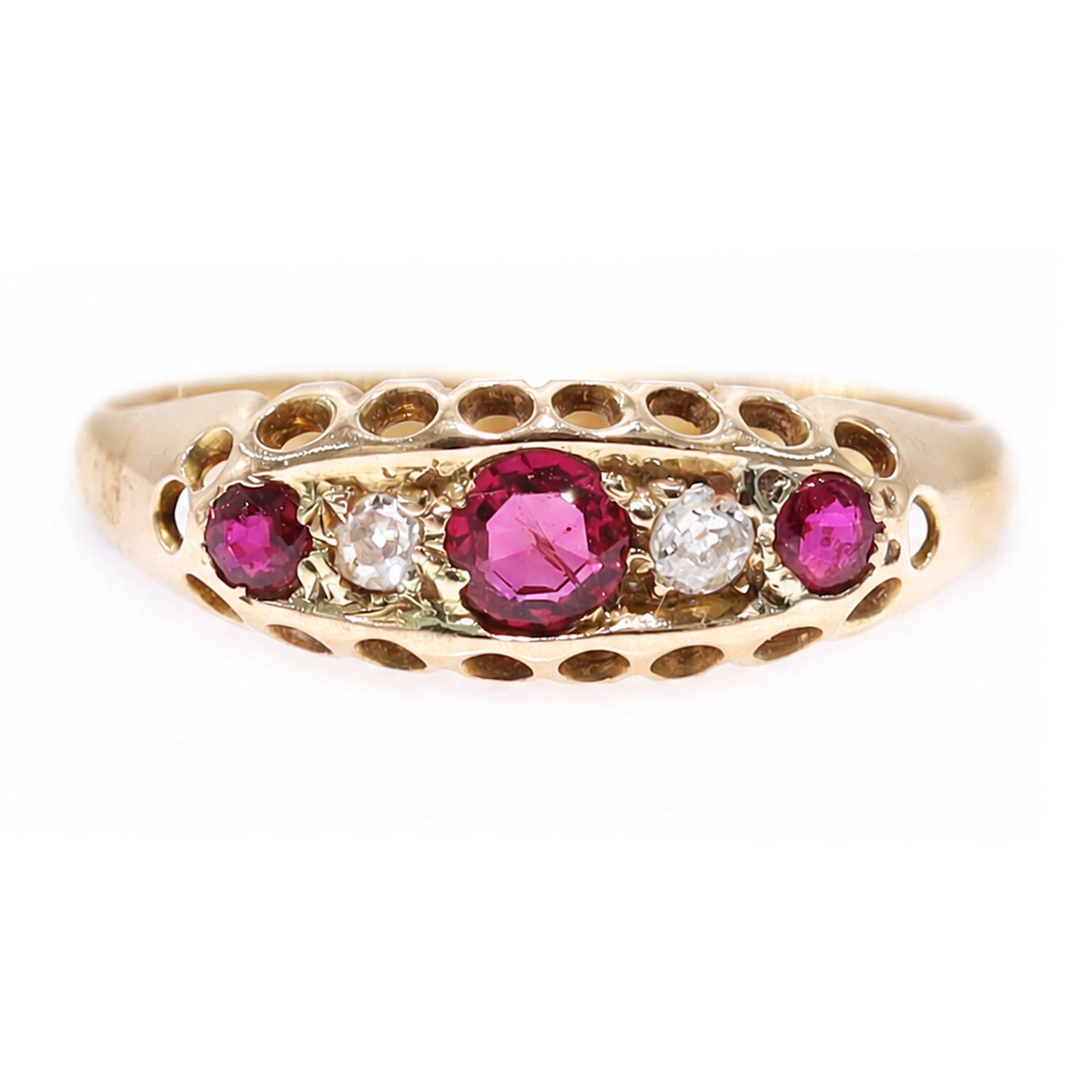 Early 20th century 18ct gold ruby and diamond ring, three round cut rubies, spaced by two old cut diamonds, Chester 1914, 