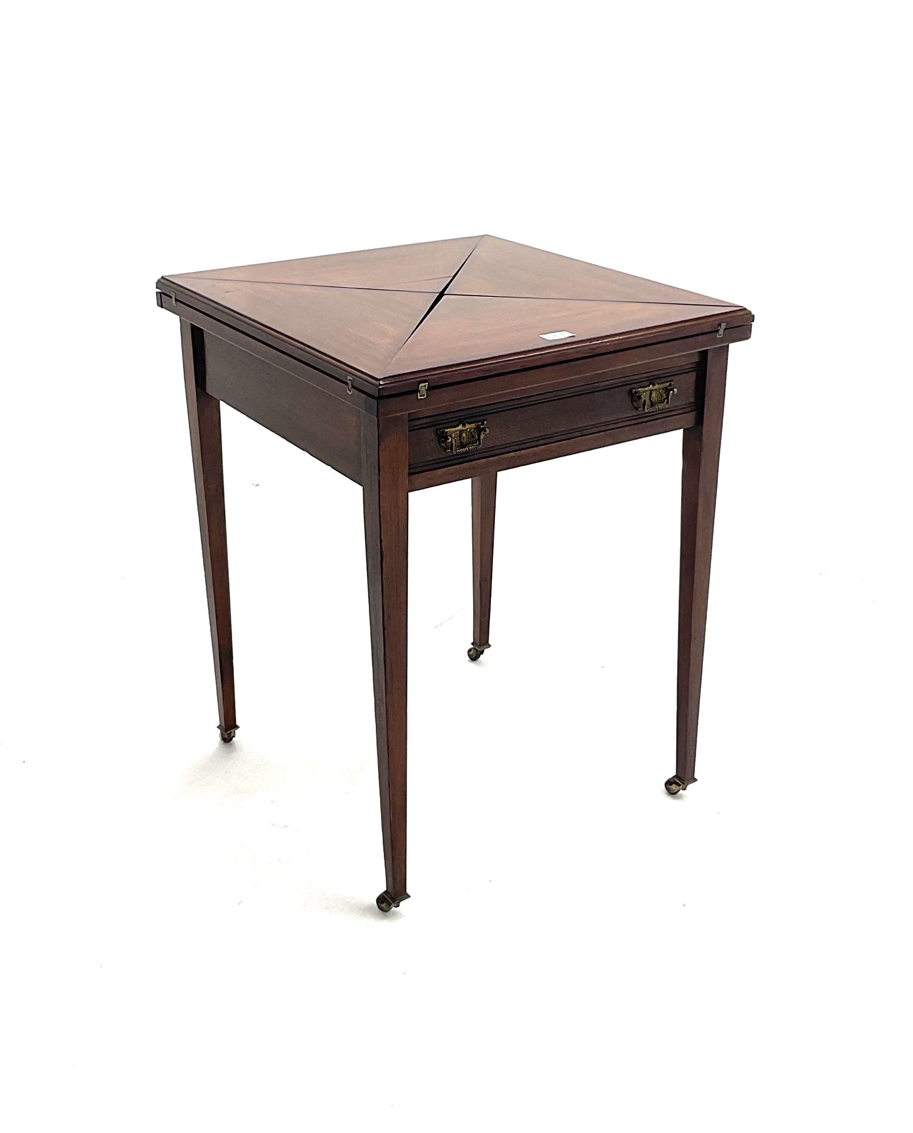 Edwardian envelope card table, inlaid baize top, four counter wells, stile supports and castors 
