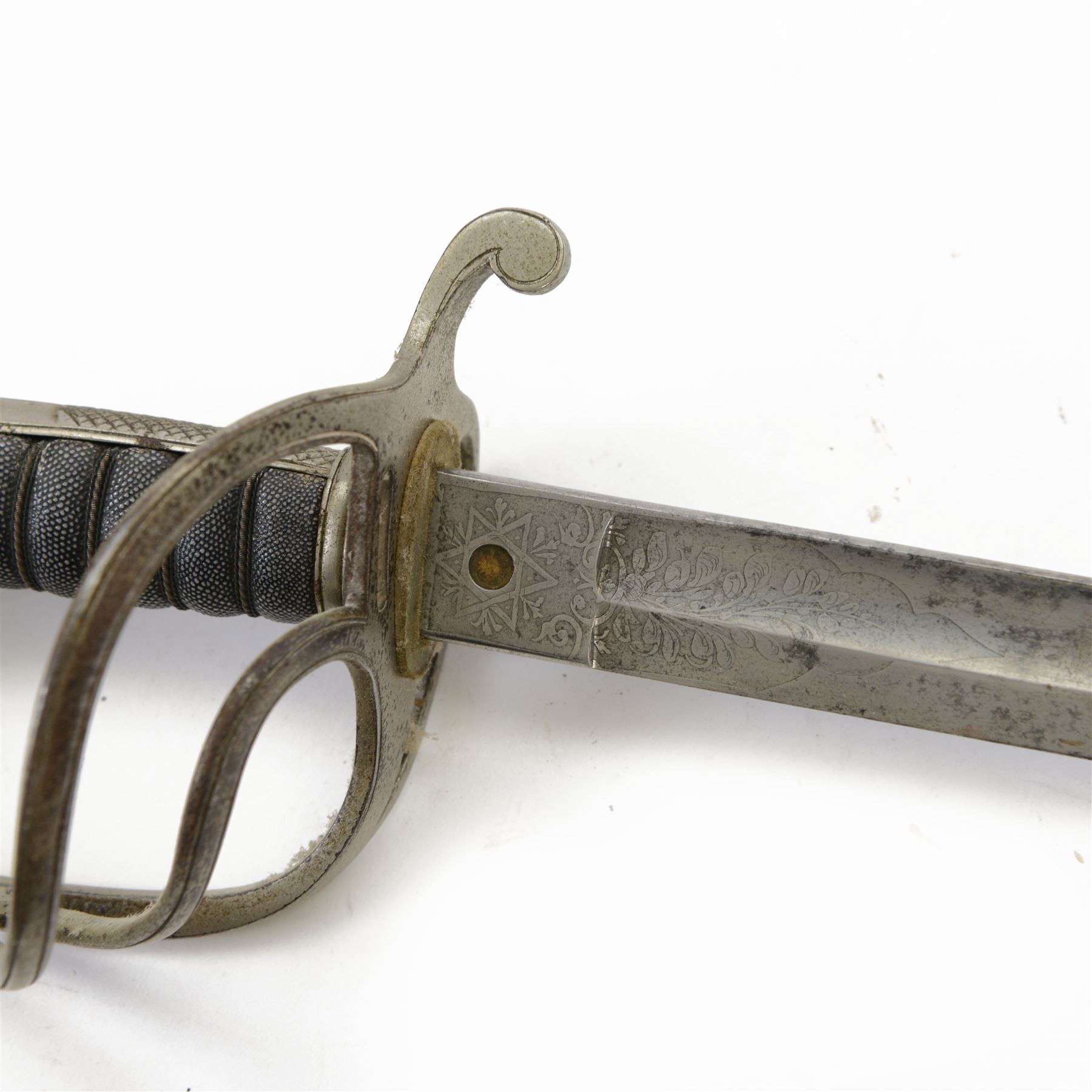 British Artillery Officer's sword by J. Daniels & Co, Artillery Place Woolwich, the 88cm steel blade engraved Durham R.G.A (H.E), wirebound fishskin grip, chequered backstrap and stepped domed pommel, in brown leather scabbard, overall L104cm