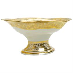 Early 19th century Derby comport of shaped oval design, the interior painted with a large spray of Spring flowers, the gilt border with a continuous band of flower heads repeated on the oval foot, red painted mark, pattern 42 L34cm