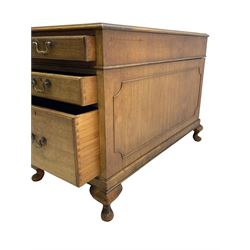 Early 20th century mahogany twin pedestal desk, the moulded rectangular top with three sectional leather insets with gilt decoration, fitted with eight drawers, on cabriole feet