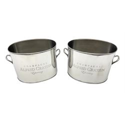 Pair of 20th century nickel plated champagne coolers inscribed Alfred Gratien Champagne, each flanked by twin loop handles, height 18cm