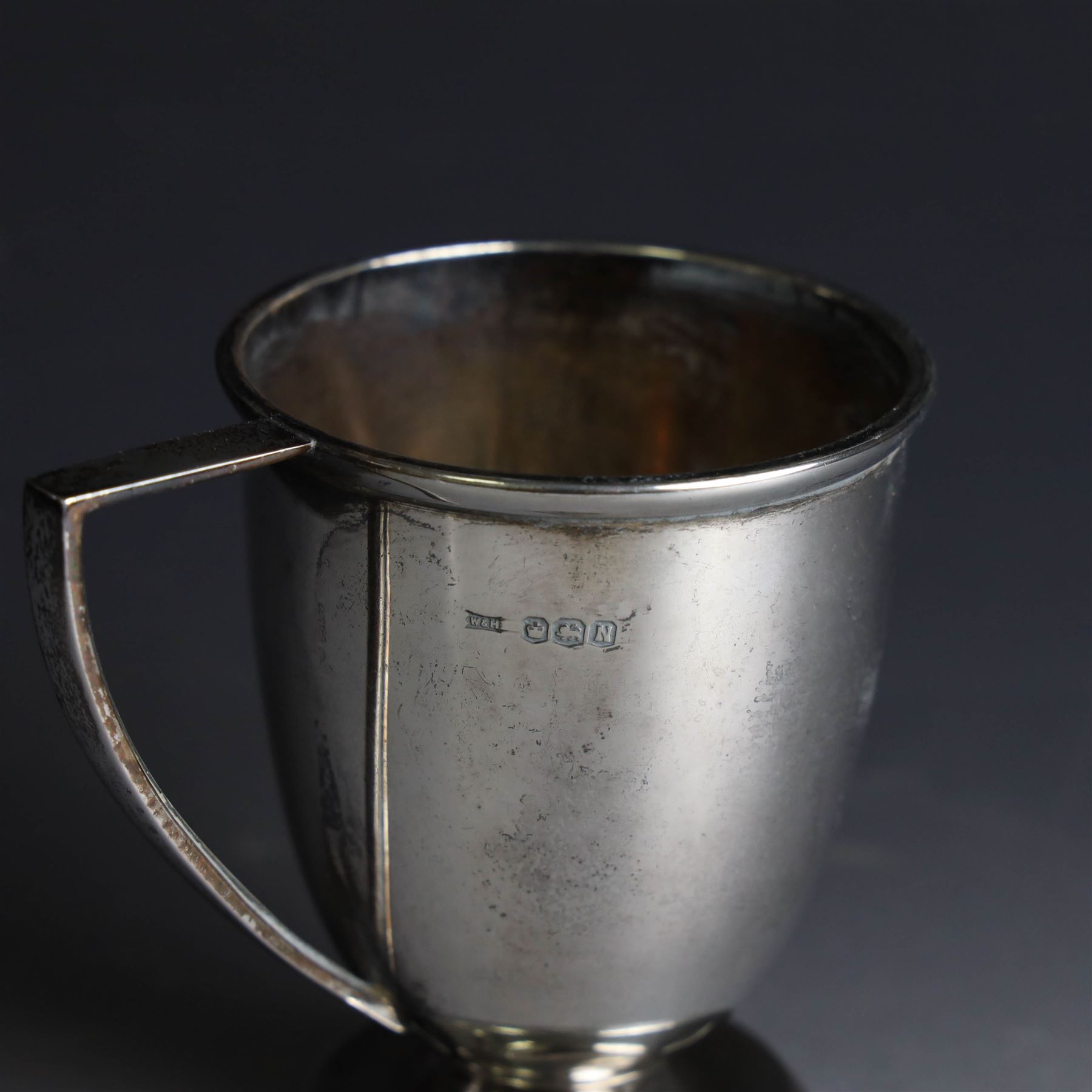 Two early 20th century silver christening mugs, both with engraved initials, both hallmarked, tallest H7.5cm