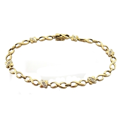  9ct gold bracelet with cross link sections each set with a diamond chip, stamped 375   