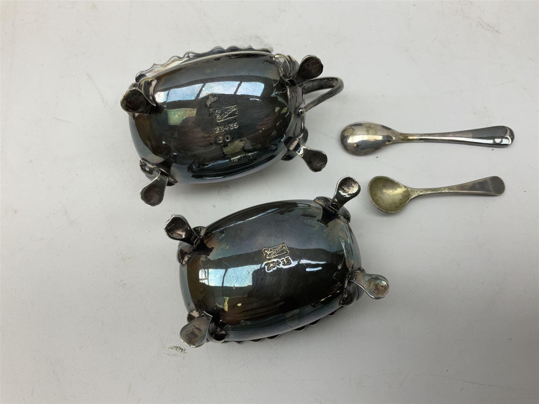 Quantity of assorted silver plated and other flatware, to include part sets, set of three silver plated cruets, glass sifter with silver plated cover, two glass decanters and stoppers, etc., in one box 