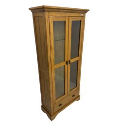 Oak display two door bookcase display cabinet, with drawer, illuminated interior