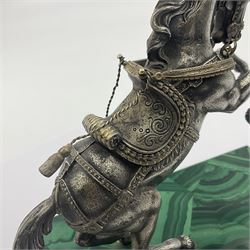 Modern silver model of a rearing horse, with ornate parcel gilt saddle and bridle, mounted upon a rectangular base, decorated with malachite panels to each side and upon four gilt bun feet, horse stamped 925, overall H14.5cm