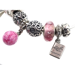  Two silver Pandora charm bracelets, with eighteen Pandora charms total, all stamped 925 ALE   