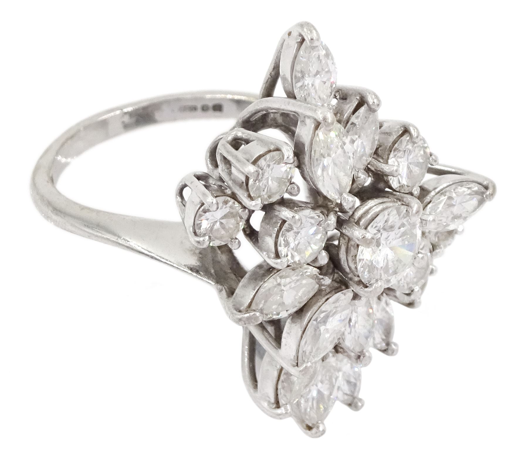 18ct white gold round brilliant cut and marquise cut diamond, stepped design cluster ring, London 1975, total diamond weight approx 3.10 carat