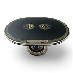 Italian Neoclassical inspired ebonised gloss dining table with four matching chairs,  circular top with additional leaf (Extends to  145cm) with Greek key banding, on a shaped pedestal base with gilt highlights and stepped plinth, the chairs en suite with padded back and seat with Greek key, reeded front supports