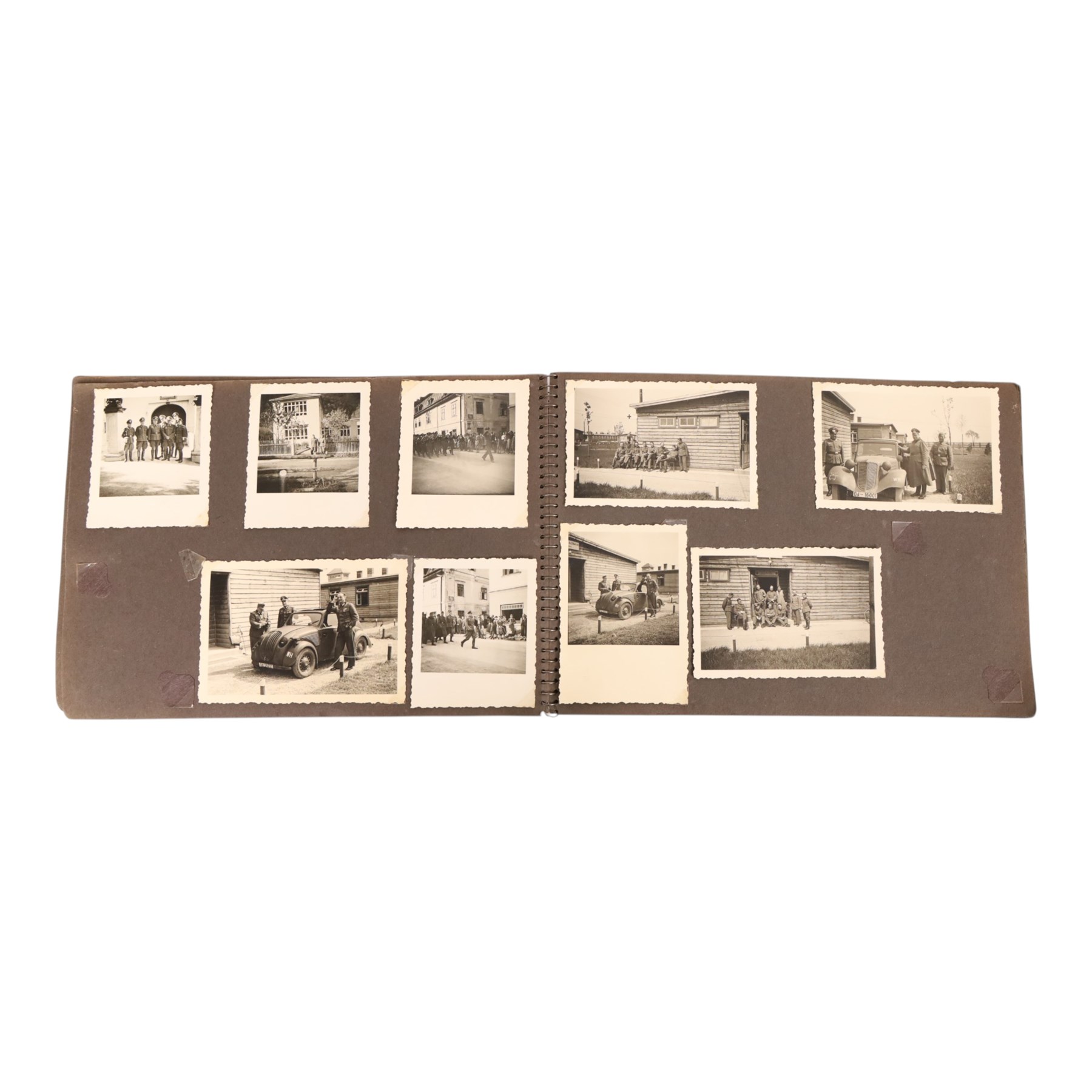 WWII German Soldiers photo album, 1942, including photographs of soldiers in uniform posing during parade etc  