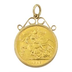 King George V 1912 gold half sovereign coin, loose mounted in 9ct gold pendant