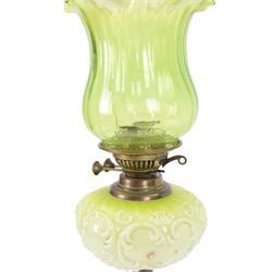 Green glass and brass oil lamps, with frilled glass shade, reservoir decorated with flowers, upon corinthian column with square base, H74cm