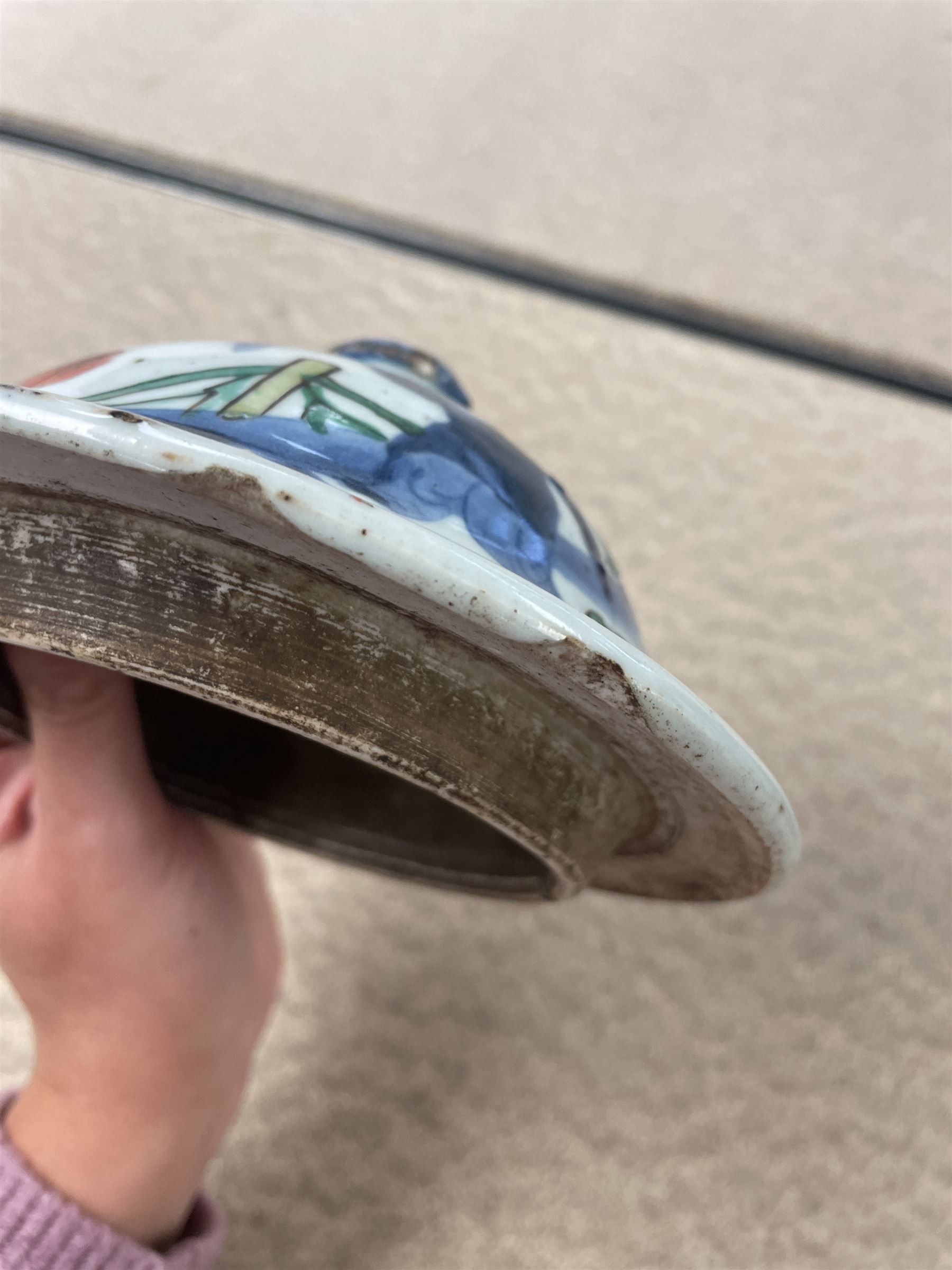 17th century Transitional period Chinese Wucai vase and cover, of baluster form, the body painted with ladies upon a terrace, and figures upon horseback and attendants within a fenced garden, the domed cover with knop finial painted with boys at play, H37cm
