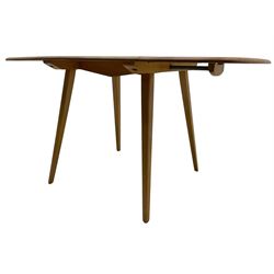 Ercol - elm and beech dining table, rectangular drop-leaf top on splayed square tapering supports 