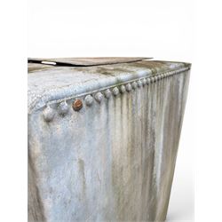 Large early 20th century galvanised water, cube form  with rounded corners and buttoned detail, with tap