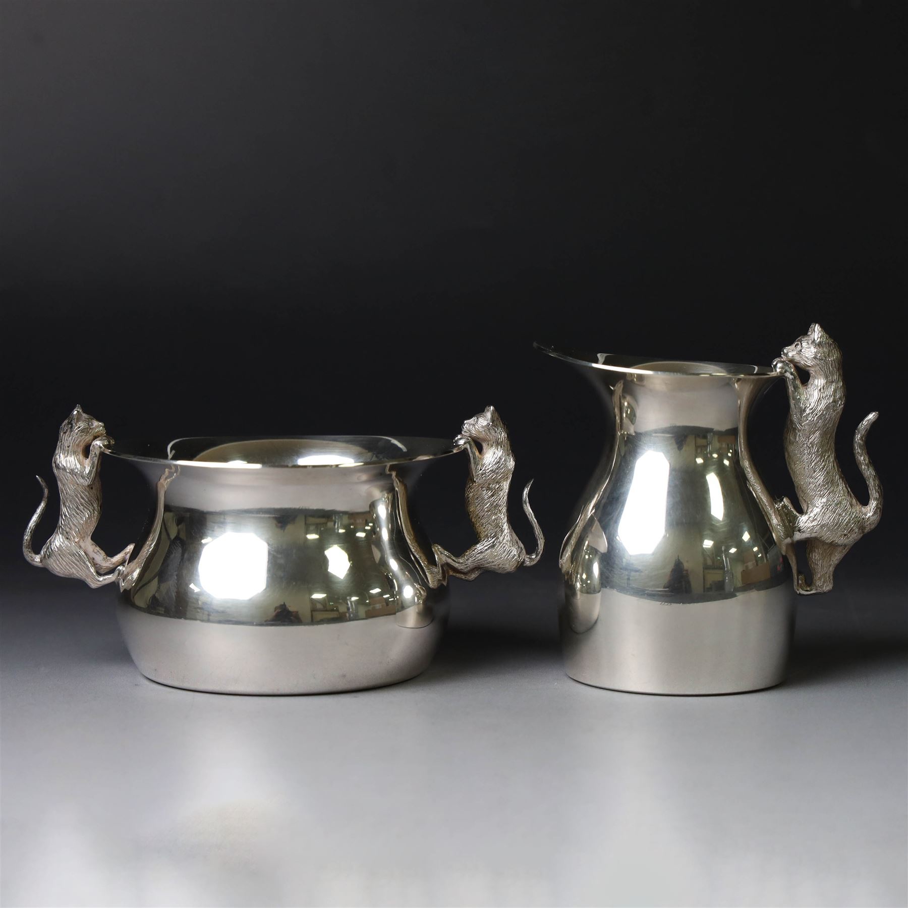 Modern silver cream jug and sugar bowl, each of waisted plain form, the handles modelled as cats, hallmarked Nicholas Plummer, London 2002, jug H8cm