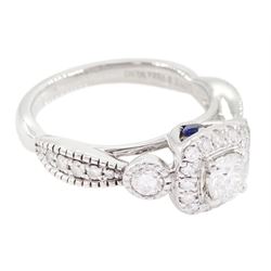 Vera Wang 18ct white gold diamond and sapphire 'Love' ring, round brilliant cut diamond cluster, with diamond set shoulders and sapphire set gallery, total diamond weight 0.70 carat, boxed
