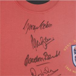 Signed 40th anniversary 1966 England World Cup shirt, signed by Gordon Banks, George Cohen, Ray Wilson, Jack Charlton, Alan Ball, Nobby Stiles, Roger Hunt, Martin Peters and Geoff Hurst, framed with certificate of authenticity from Richard Hill verso, frame H91cm