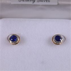 Silver and 14ct gold sapphire stud earrings, boxed