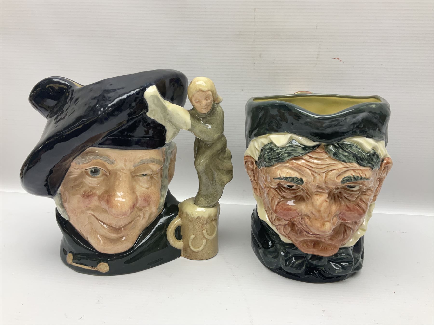 Large collection of Royal Doulton character jugs, to include Robinson Crusoe D6532, Tam O Shanter D6632, The Falconer D6533 etc, together with similar charater jugs and toby jugs   
