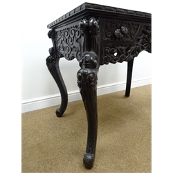  Early 20th century Chinese table, frieze carved with mythical creature with four drawers, dragon cabriole legs, W100cm, H77cm, D70cm  