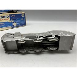Schylling Collector Series clockwork tin-plate Sir Ian's Bluebird Land Speed Record Car with key and paperwork No.006080; boxed; and clockwork silvered tin-plate model of an 0-6-0 locomotive; unboxed (2)