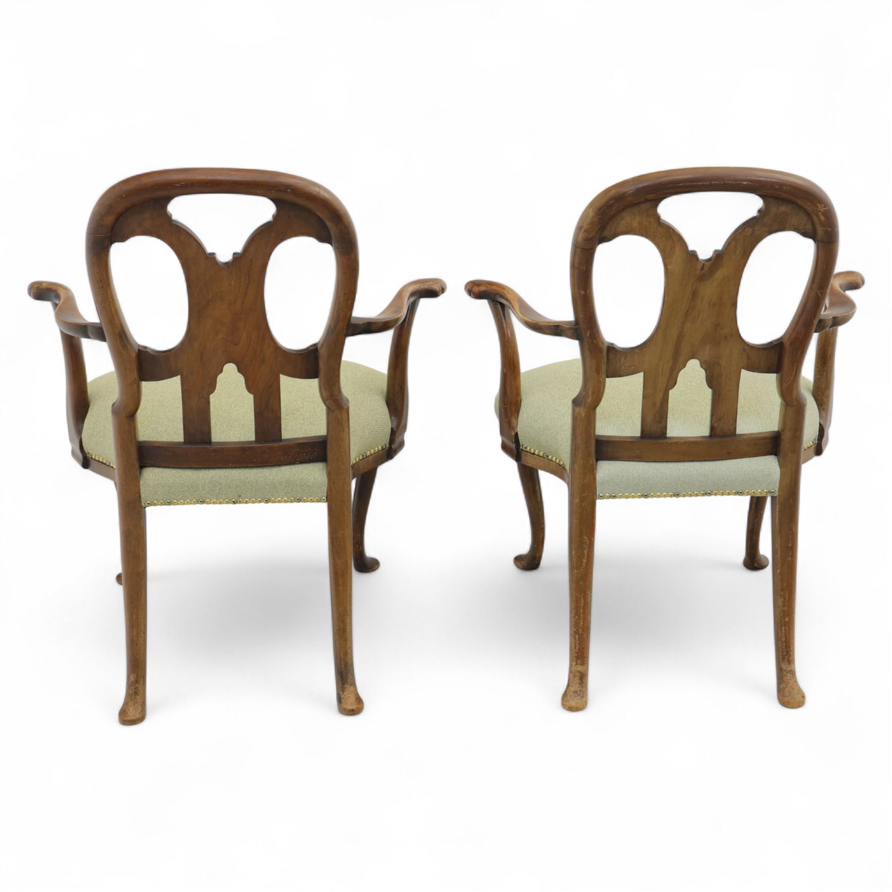 Pair of 1930s Queen Anne design walnut-framed open armchairs with vase-shaped pierced back splat and scroll end arms above a padded serpentine seat, raised on cabriole legs with pad feet