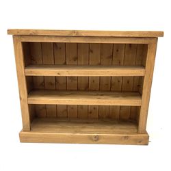 Solid pine open bookcase with two adjustable shelves, plinth support