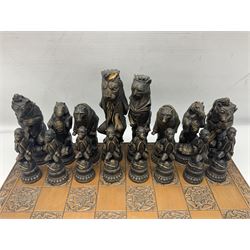 Chess set and resin chess pieces moulded as various animals, the pawns as monkeys, Kings as lions etc, board L46cm, W46cm, king H19cm