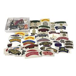 Canadian metal and cloth badges, including Princess Patricias Canadian Light Infantry, Ontario Regiment, 29th Waterloo Regiment, Grenadier Guards, Logistics, Combined Services, Saskatchewan Dragoons, Irish Regiment of Canada, Sakatoon Light Infantry etc