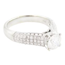 18ct white gold diamond ring, set with a single round brilliant cut diamond of approx 1.10 carat, five row pave set diamond shoulders and gallery, stamped 750, total diamond weight approx 1.50 carat