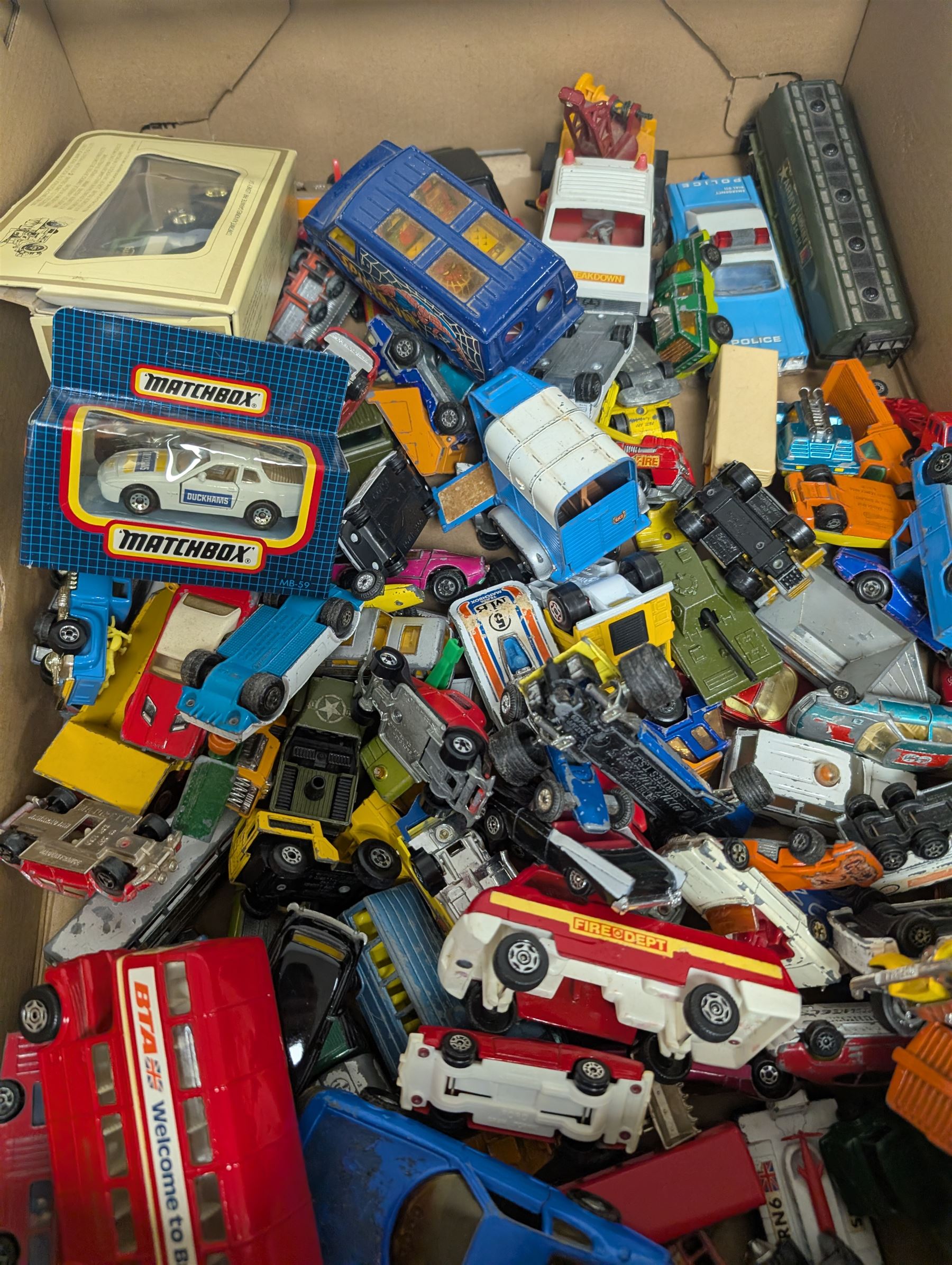 Collection of playworn diecast model vehicles, including Corgi, together with vintage Enid Blyton and Roald Dahl books