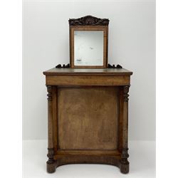 Early Victorian figured mahogany dressing cabinet, the raised shell and scroll carved back lifts to reveal rectangular easel mirror with mahogany band, flat rectangular top with tooled leather inset, slide at each side with matching leather inset, full width drawer above cupboard enclosing a series of five drawers, turned front supports, panelled front, sides and back