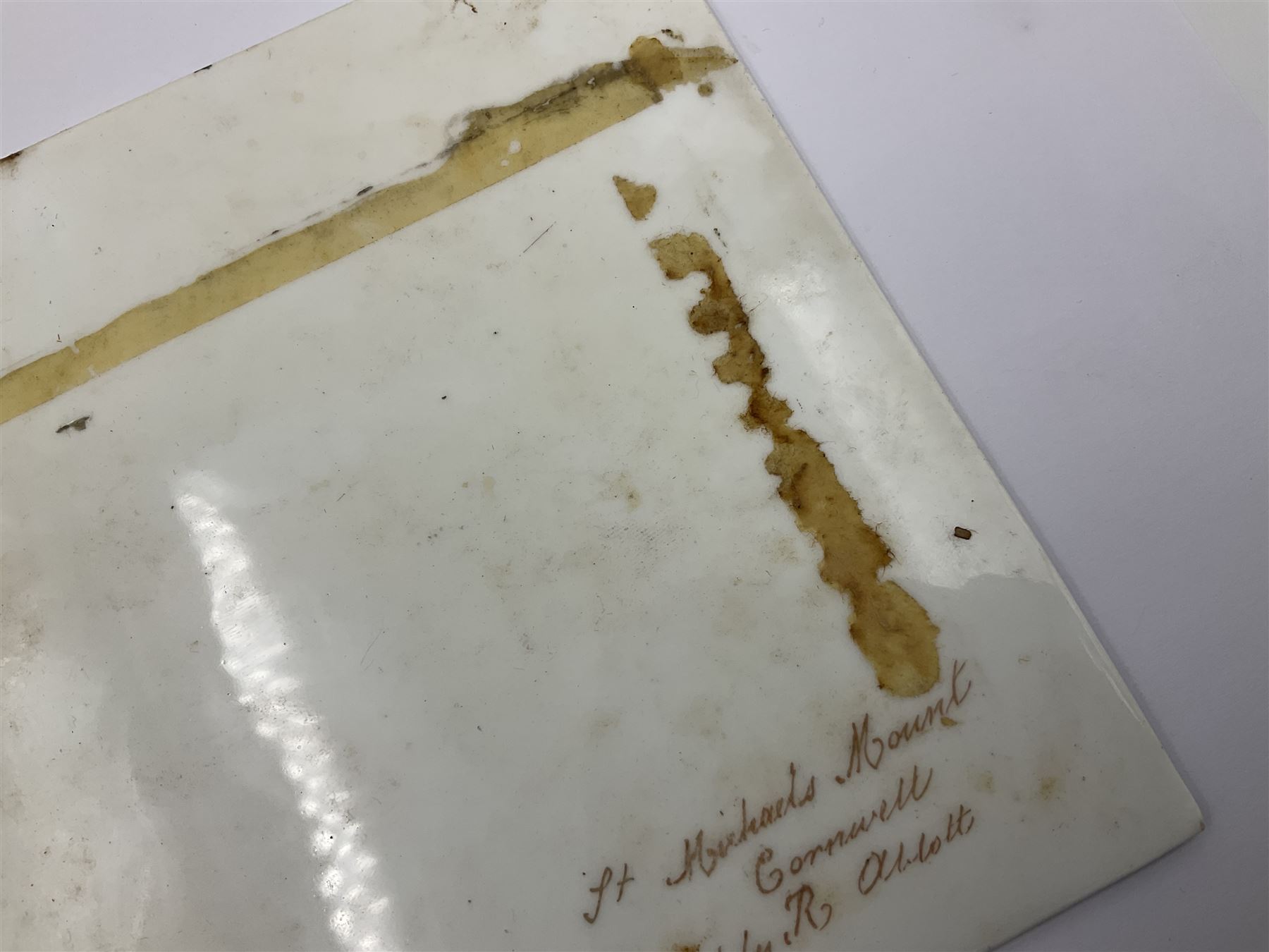 Richard Abbott: St Michael’s Mount, painted oil on porcelain plaque, with 'St Michaels Mount painted by R. Abbott', inscribed on reverse, H15cm, W19cm