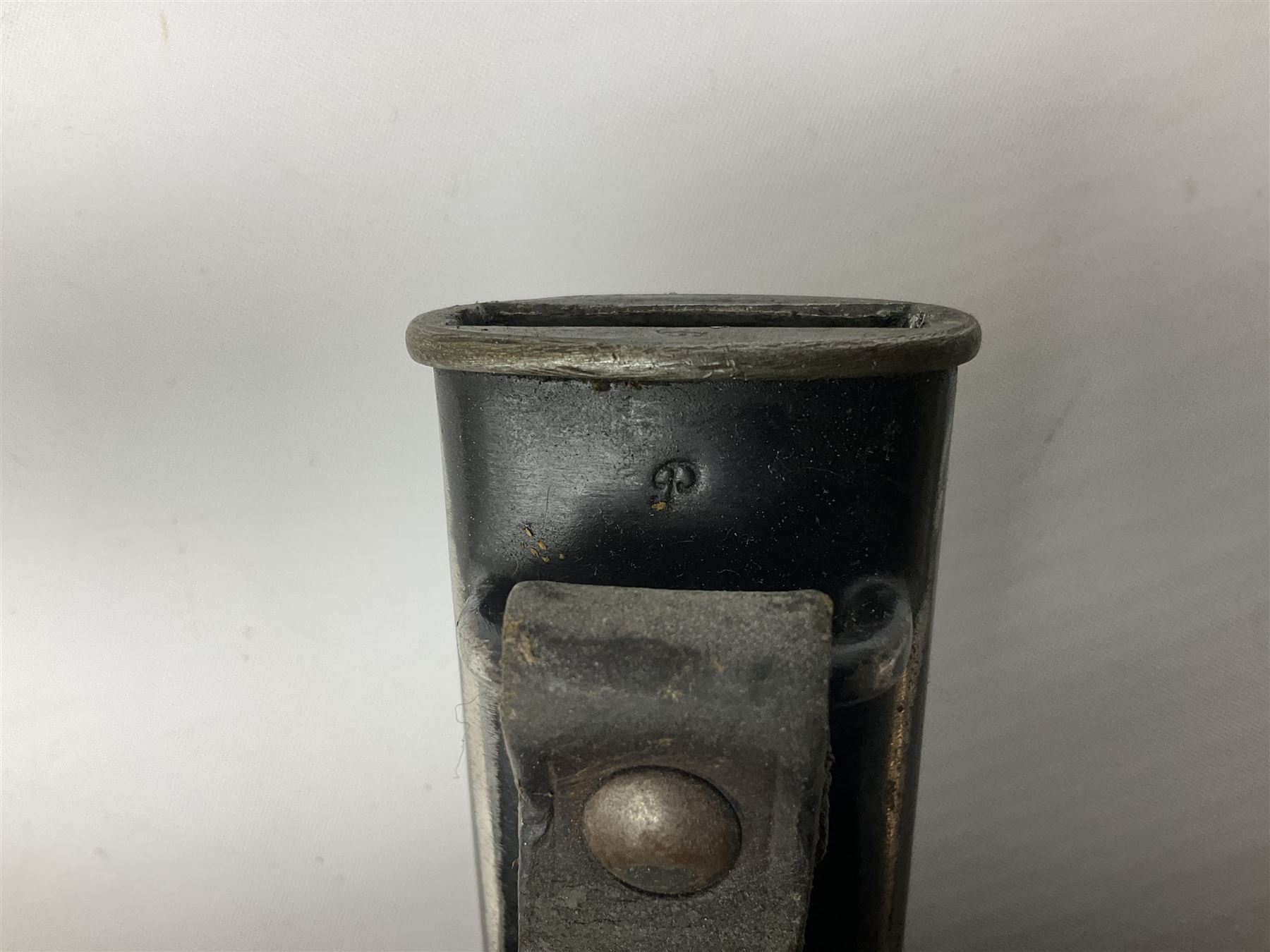 British Enfield 1907 model SMLE bayonet, with 43cm fullered steel blade and metal mounted leather scabbard L58cm overall; and Schmidt-Rubin Model 1918 bayonet the 30cm steel blade marked Elsener Schwyz No.579722; in steel scabbard with leather frog marked G. Bertolini Sellaio Vira/G.Tic 79 L45cm overall (2)