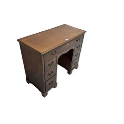 Georgian design twin pedestal kneehole desk, rectangular top with moulded edges over single frieze drawer and knee drawer, pedestals fitted with three drawers on each side, raised on bracket feet

This item has been registered for sale under Section 10 of the APHA Ivory Act 