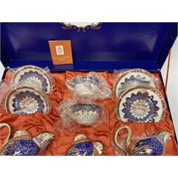 A Royal Crown Derby Quail teaset, comprising teapot, milk jug, and sucrier, all modelled in the form of quails, two cups, two saucers, and two side plates, decorated in the Imari palette, with printed marks beneath, in fitted makers box. 