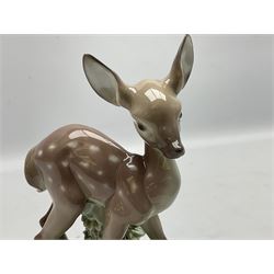 Two Lladro deer figures, comprising A Fawn and Friend no 5674 and Hi There no 5672, both with original boxes, largest example H14.5cm