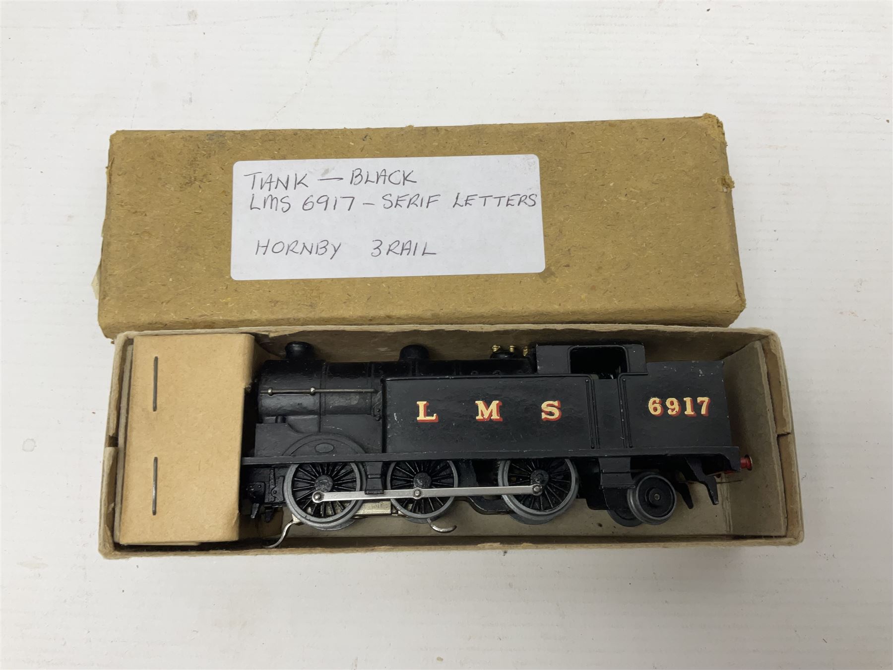 Hornby Dublo - 3-rail - Class N2 0-6-2 locomotive No.9596 in LNER green; and Class N2  0-6-2 tank locomotive No.6917 in LMS black with serif letters; together with a 2-rail Class N2 0-6-2 tank locomotive No.69550; each in unassociated box (3)